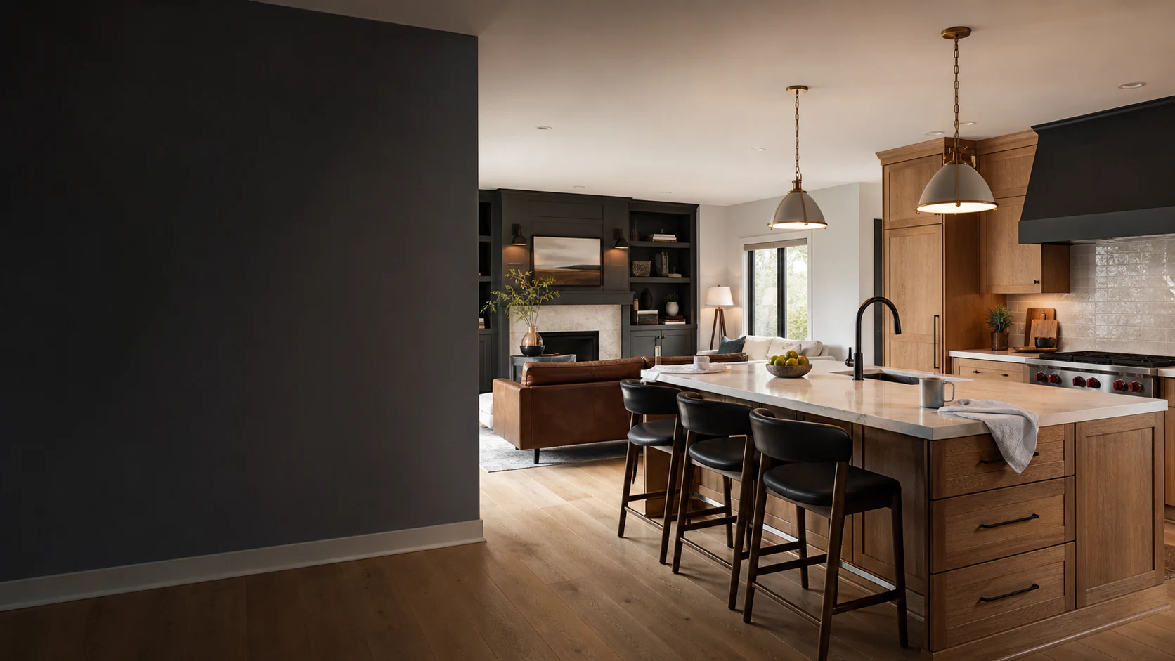 A warm remodeled kitchen opening into a charcoal accented family room